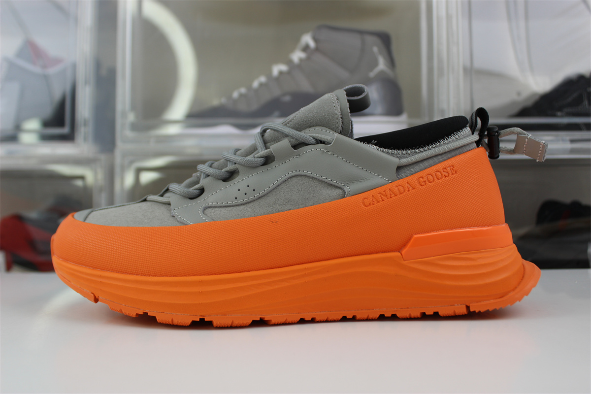 Can*a Go*e glacier trail sneaker grey orange