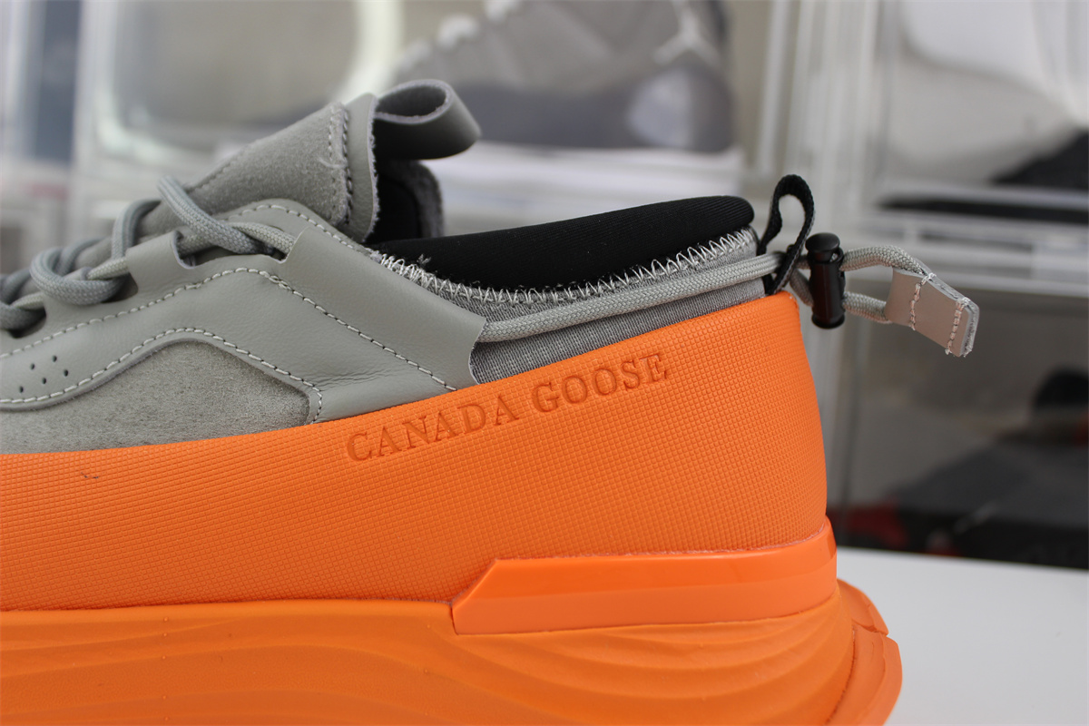 Can*a Go*e glacier trail sneaker grey orange