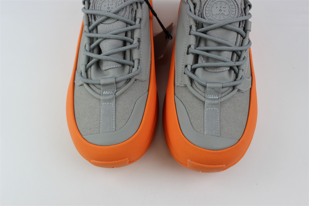 Can*a Go*e glacier trail sneaker grey orange