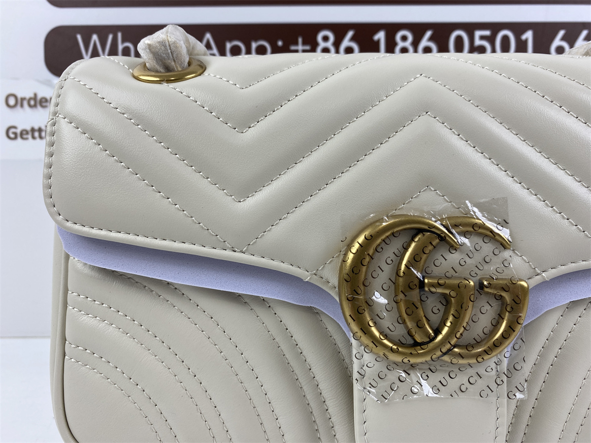 G*u*i pure white bag