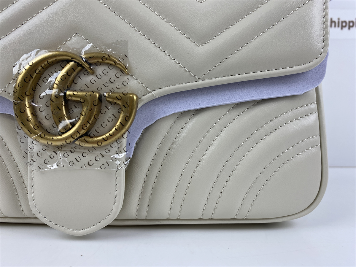 G*u*i pure white bag