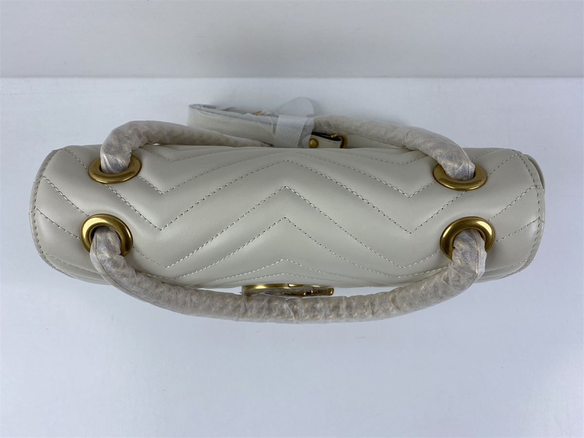 G*u*i pure white bag
