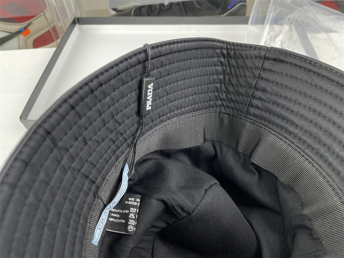 Pra*a black bucket hat