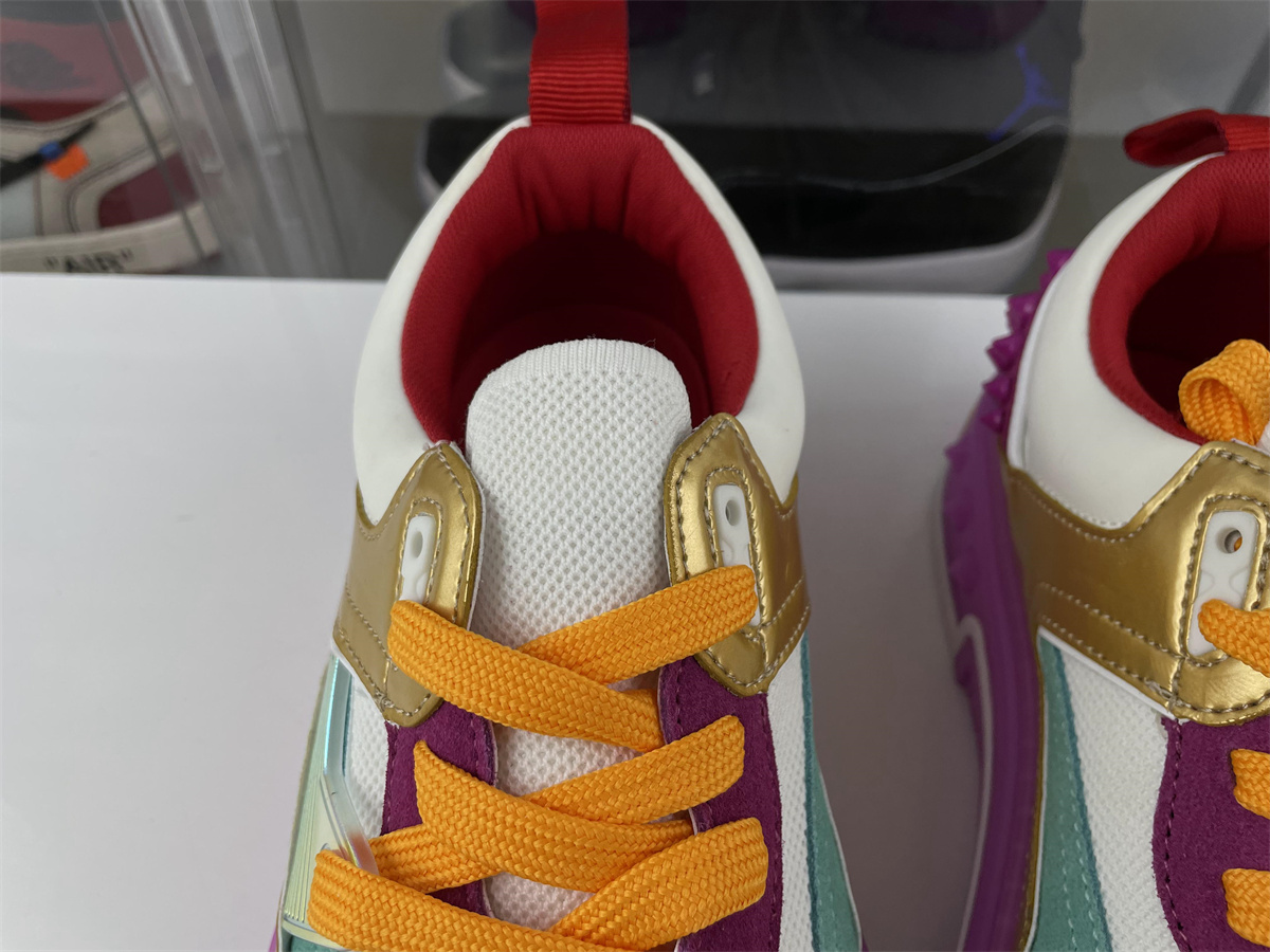 Chirstian CL Purple Gold colors