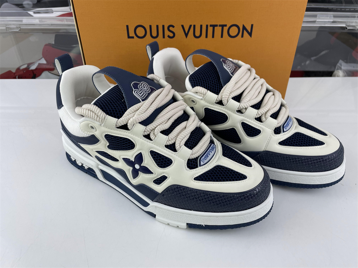l**is V*t*n lv trainer dark blue four leaf clover