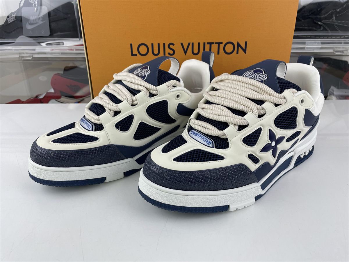 l**is V*t*n lv trainer dark blue four leaf clover
