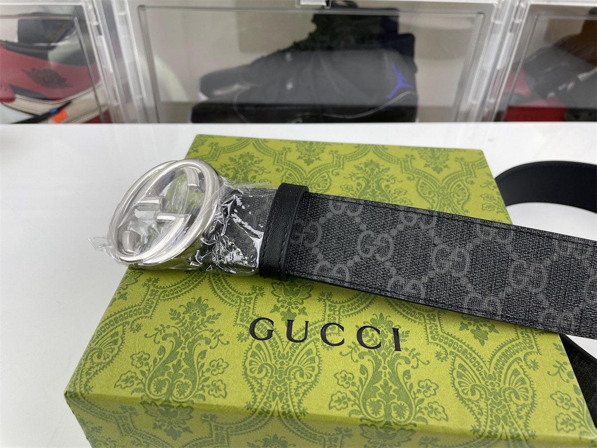 G*u*i mens belt silver head black-grey leahter