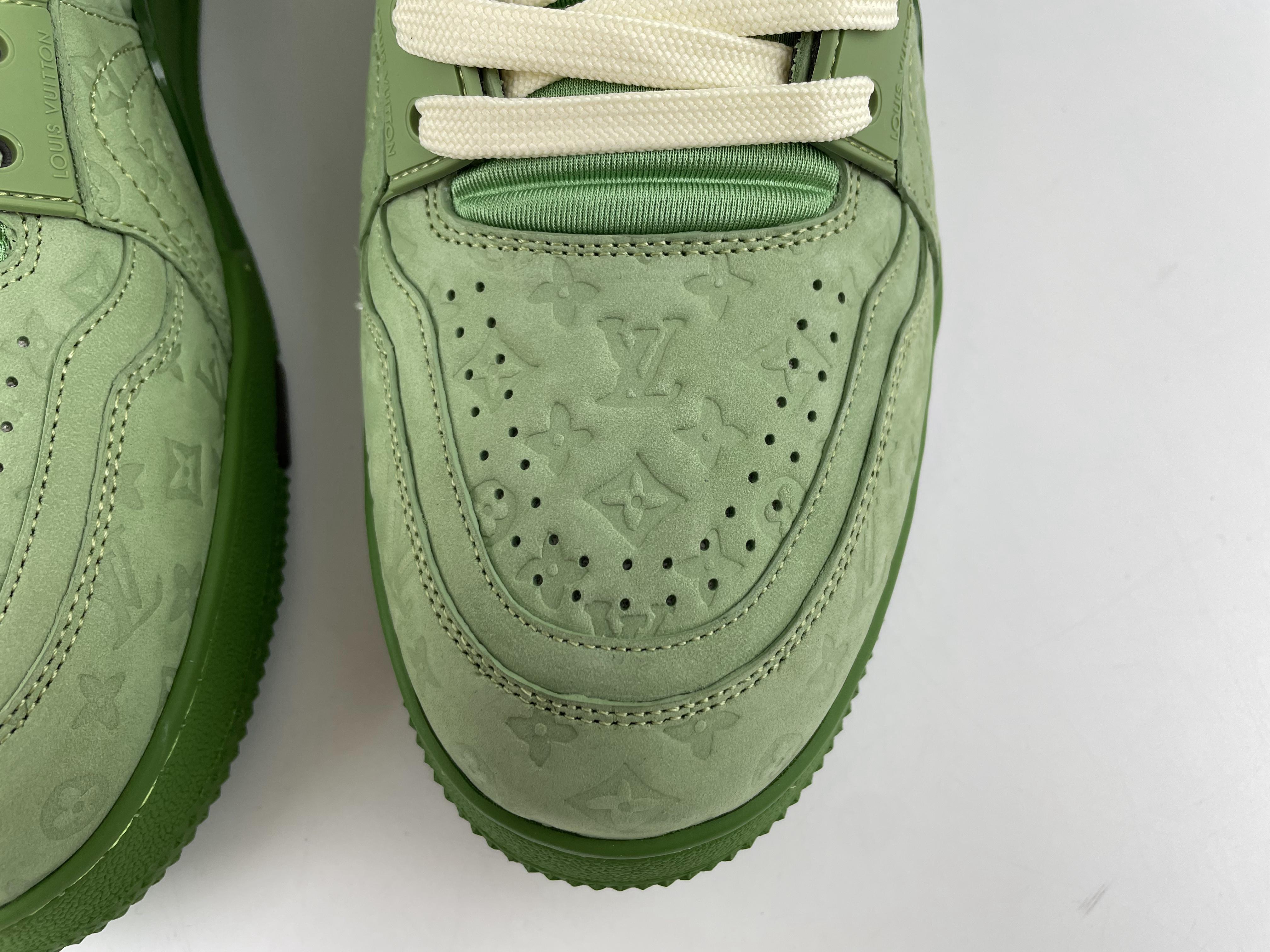 l**is V*t*n green arch light high boost sneaker